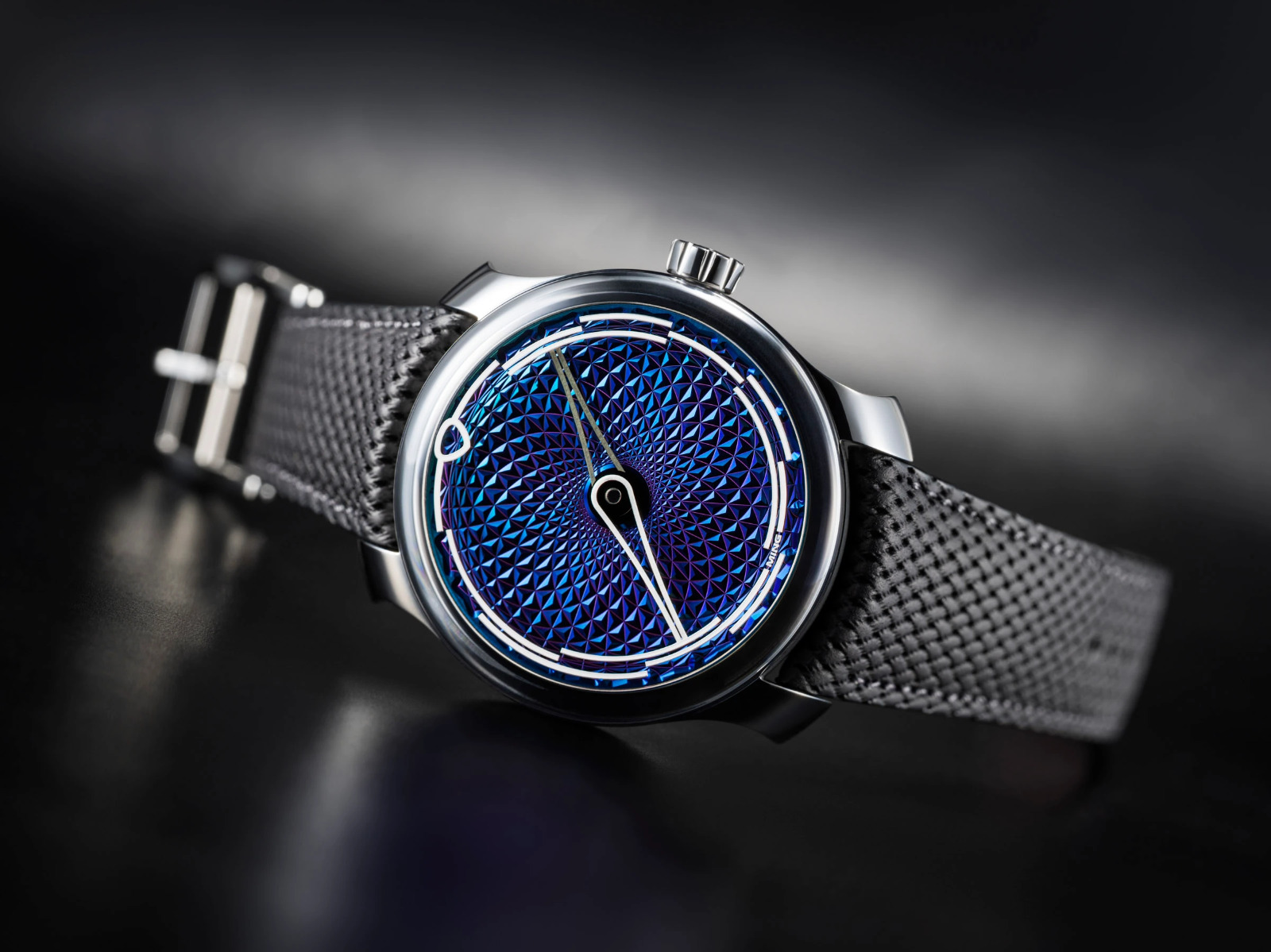 Ming 17.09 in blue with pyramid-textured dial and Design Language 2 sapphire indices.