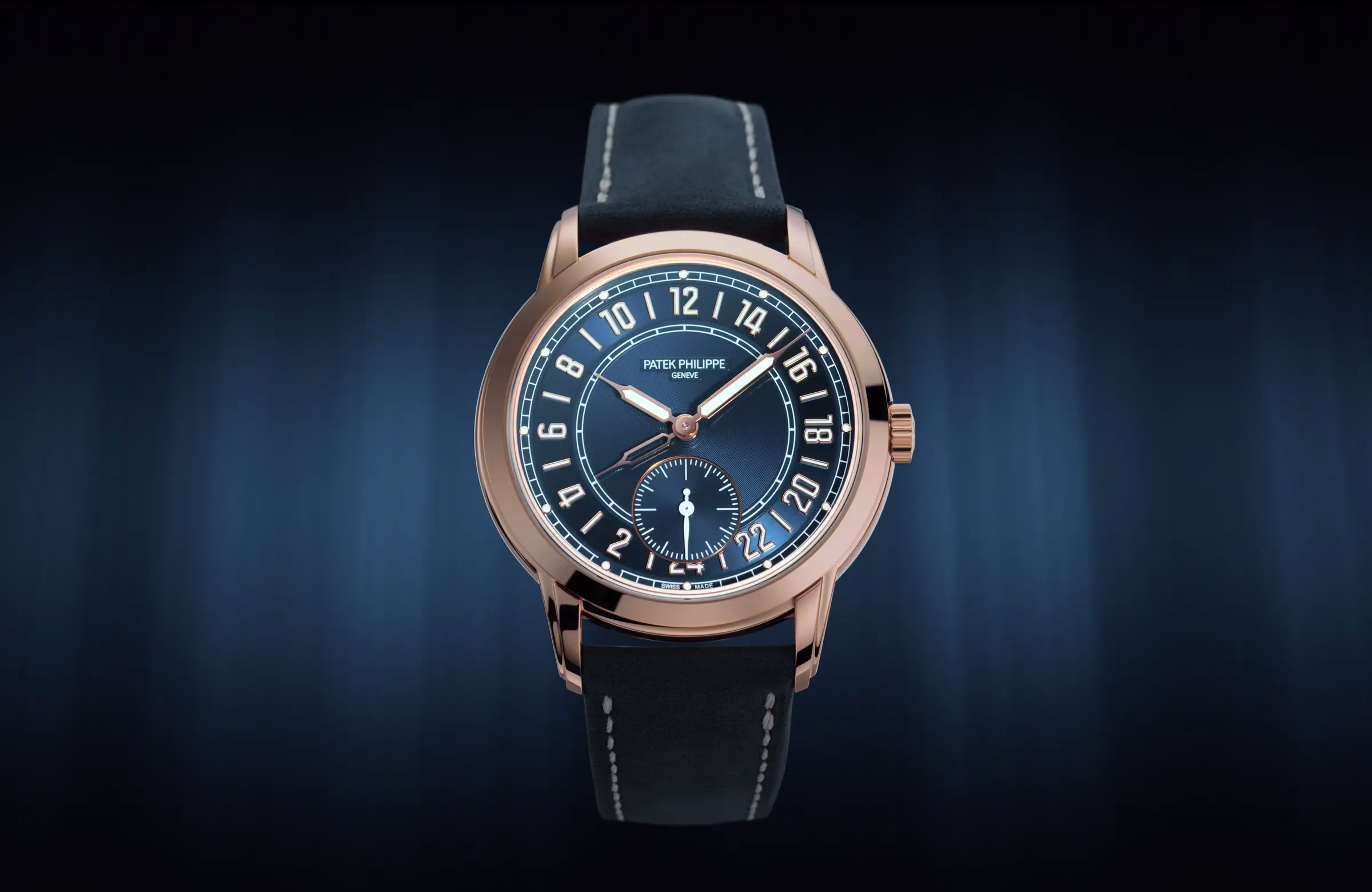 Patek Philippe Calatrava 24-Hour Display Travel Time ref. 5224R-001 in rose gold with blue dial, central 24-hour scale, and small seconds at 6 o'clock.
